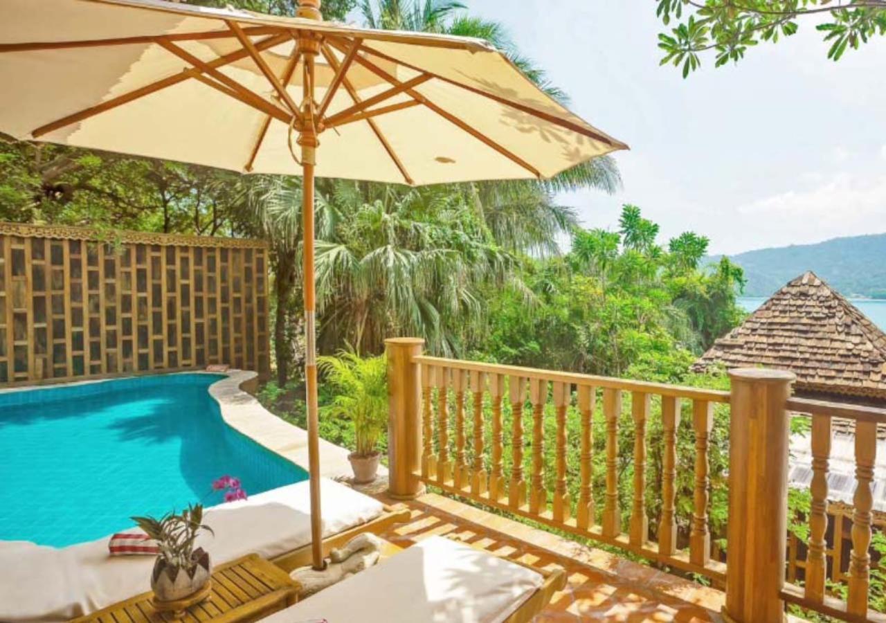 Santhiya Koh Phangan Resort&Spa - SHA Extra Plus Bagian luar foto A pool at the resort